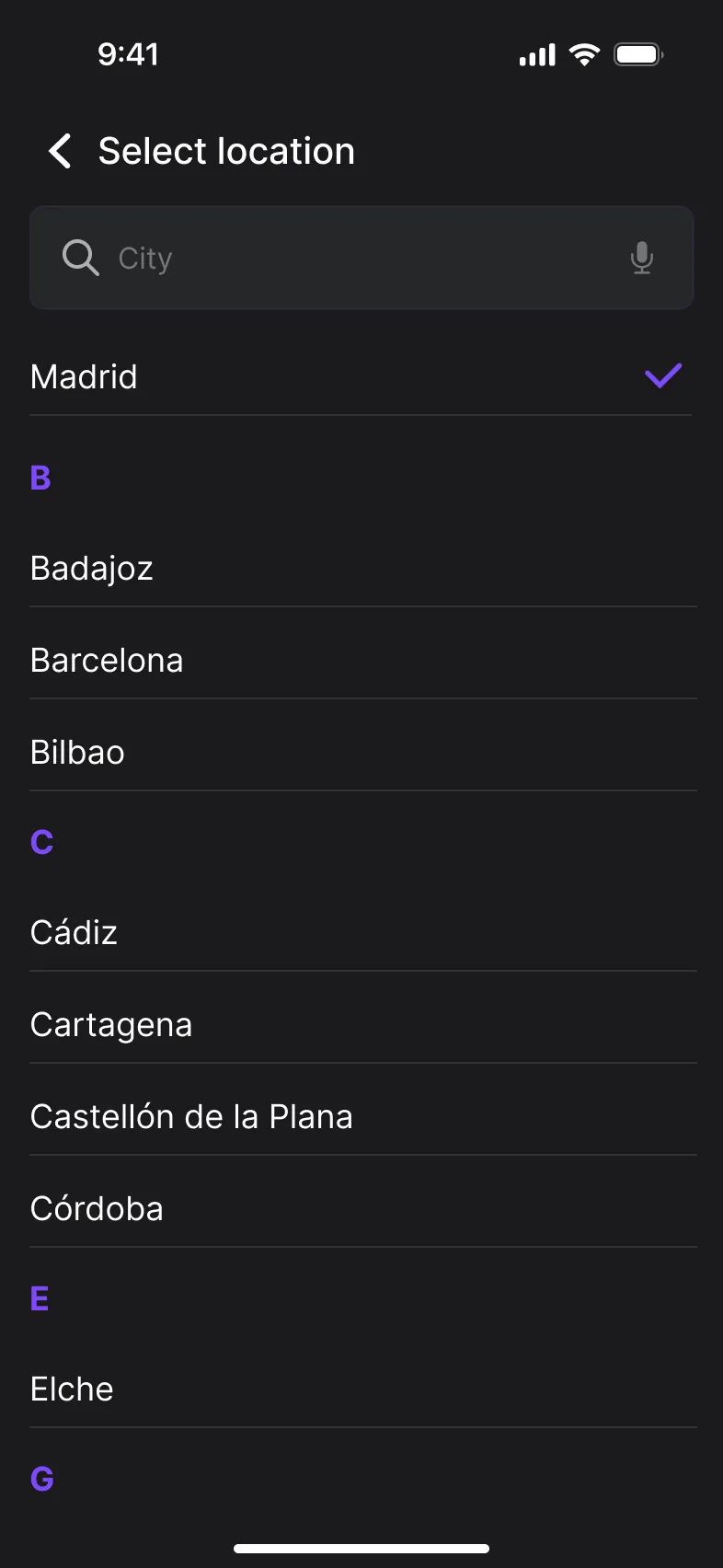 Select location screen: a city search field and an alphabetical list of Spanish cities with Madrid selected